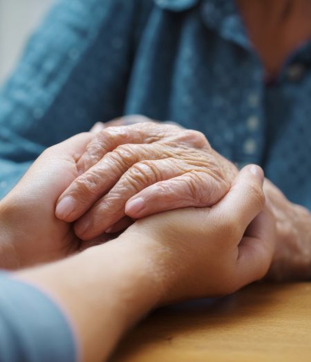 Teen holding grandmother‚Äôs hand during doctor call --ar 3:2 --v 7 Job ID: 54f0e887-747a-4c9b-8b26-01aa0842245f